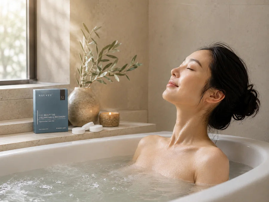A calm carbonated bath wellness scene in a warm minimalist bathroom.